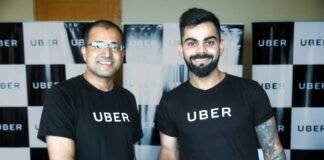 Amit Jain President Uber India SA with Uber India's Brand Ambassador Virat Kohli Captain Indian Cricket Team